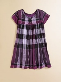 Pretty patterning, classic checks, a ruffled scoopneck and full skirt in an empire silhouette on plush cotton.Ruffled scoopneckShort sleevesFront button placketEmpire waist97% cotton/2% nylon/1% elastaneMachine washImported Please note: Number of buttons may vary depending on size ordered. Pretty patterning, classic checks, a ruffled scoopneck and full skirt in an empire silhouette on plush cotton.Ruffled scoopneckShort sleevesFront button placketEmpire waist97% cotton/2% nylon/1% elastaneMachine washImported Please note: Number of buttons may vary depending on size ordered.
