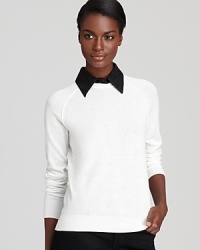 This BCBGeneration sweater knows how to pop that collar! On-trend with a detachable neck piece, this cotton blend knit is a versatile wardrobe addition. This BCBGeneration sweater knows how to pop that collar! On-trend with a detachable neck piece, this cotton blend knit is a versatile wardrobe addition.