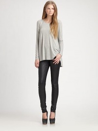 An instant Alice + Olivia staple, this easy dropped-shoulder jersey style embraces the light, effortless mindset that's become one of the designer's essential styles.RoundneckLong sleevesFlared hemGathered back with binding detail94% tencel/6% polyurethaneDry cleanImportedModel shown is 5'8½ (174cm) wearing US size Small. An instant Alice + Olivia staple, this easy dropped-shoulder jersey style embraces the light, effortless mindset that's become one of the designer's essential styles.RoundneckLong sleevesFlared hemGathered back with binding detail94% tencel/6% polyurethaneDry cleanImportedModel shown is 5'8½ (174cm) wearing US size Small.