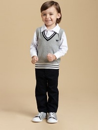 Smart, snug and handsome, combining the style of a sweater vest with the simplicity of a pique polo shirt.Ribbed polo collarLong sleevesButton downRibbed cuffs and hemCottonDry cleanImported Smart, snug and handsome, combining the style of a sweater vest with the simplicity of a pique polo shirt.Ribbed polo collarLong sleevesButton downRibbed cuffs and hemCottonDry cleanImported