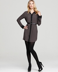 The ever-timeless shirtdress silhouette for classic daytime style that always looks appropriate...and fabulous. The ever-timeless shirtdress silhouette for classic daytime style that always looks appropriate...and fabulous.