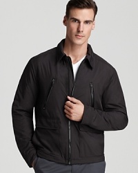 Luxe leather trims zipped details on Michael Kors' timeless bomber jacket. Luxe leather trims zipped details on Michael Kors' timeless bomber jacket.