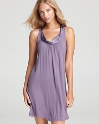 A timeless sleep silhouette, this sleeveless chemise from Midnight by Carole Hochman is perfect on its own or under a fleece robe. A timeless sleep silhouette, this sleeveless chemise from Midnight by Carole Hochman is perfect on its own or under a fleece robe.
