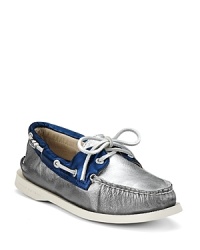 This nautical look comes in silver in the fashion footwear race: set sail in these Sperry Top-Sider classics-with-a-twist. This nautical look comes in silver in the fashion footwear race: set sail in these Sperry Top-Sider classics-with-a-twist.