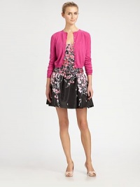 Sumptuous cashmere sweater in an abbreviated silhouette, finished with a shimmering silk finish. RoundneckButton frontLong sleevesAbout 17 from shoulder to hem70% cashmere/30% silkDry cleanImportedSIZE & FITModel shown is 5'10 (177cm) wearing US size Small. Sumptuous cashmere sweater in an abbreviated silhouette, finished with a shimmering silk finish. RoundneckButton frontLong sleevesAbout 17 from shoulder to hem70% cashmere/30% silkDry cleanImportedSIZE & FITModel shown is 5'10 (177cm) wearing US size Small.