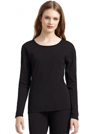 THE LOOKRoundneckPullover styleLong sleevesLonger curved back hemTHE FITAbout 24 from shoulder to hemTHE MATERIALCotton/rayonCARE & ORIGINMachine washImported THE LOOKRoundneckPullover styleLong sleevesLonger curved back hemTHE FITAbout 24 from shoulder to hemTHE MATERIALCotton/rayonCARE & ORIGINMachine washImported