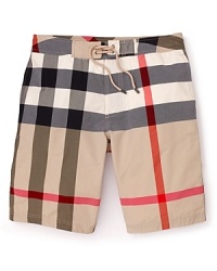 In an allover check print, these iconic swim trunks from Burberry take classic style to the seaside. In an allover check print, these iconic swim trunks from Burberry take classic style to the seaside.