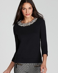 This Juicy Couture pullover is your laxest layer yet as a statement embellished collar adorns the neckline for effortlessly elegant look. This Juicy Couture pullover is your laxest layer yet as a statement embellished collar adorns the neckline for effortlessly elegant look.