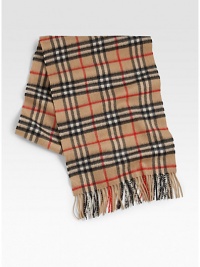 Iconic plaid design enhances this luxurious winter staple.Fringed edgesAbout 13W x 61LCashmereDry cleanImported Iconic plaid design enhances this luxurious winter staple.Fringed edgesAbout 13W x 61LCashmereDry cleanImported