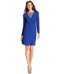 With a deep V-neckline and strappy mesh details, this BCBGMAXAZRIA dress is super chic for a night on the town! With a deep V-neckline and strappy mesh details, this BCBGMAXAZRIA dress is super chic for a night on the town!