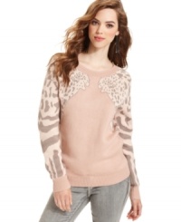 A neutral nod to animal pattern at the sleeves of this Bar III sweater adds a bold kick to the sweet and subtle colors. A neutral nod to animal pattern at the sleeves of this Bar III sweater adds a bold kick to the sweet and subtle colors.