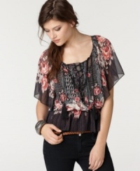 A mixed floral print and tassel tie lace-up detail adds a boho flair to this Bar III chiffon top -- adorable with skinny jeans! A mixed floral print and tassel tie lace-up detail adds a boho flair to this Bar III chiffon top -- adorable with skinny jeans!