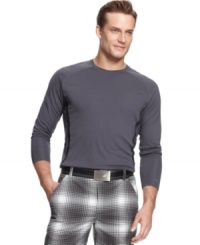Your swing will be as solid as your comfort and style in this Greg Norman for Tasso Elba performance golf shirt featuring PlayDry® technology. Your swing will be as solid as your comfort and style in this Greg Norman for Tasso Elba performance golf shirt featuring PlayDry® technology.