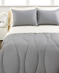 In true Calvin Klein style, this Random Wave comforter offers a sophisticated look for your room while maintaining a comfy and cozy feel for a restful night's sleep. Features a quilted wave pattern, hypoallergenic construction and the Calvin Klein signature linen label. Comes in three modern hues. In true Calvin Klein style, this Random Wave comforter offers a sophisticated look for your room while maintaining a comfy and cozy feel for a restful night's sleep. Features a quilted wave pattern, hypoallergenic construction and the Calvin Klein signature linen label. Comes in three modern hues.