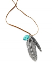 Fashion that soars. This pendant necklace from Lauren Ralph Lauren keeps your look light with this feather pendant and turquoise bead strung from a suede cord. Crafted in silver tone mixed metal. Approximate length: 18 inches + 2-inch extender. Approximate drop: 4 inches.