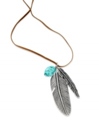 Fashion that soars. This pendant necklace from Lauren Ralph Lauren keeps your look light with this feather pendant and turquoise bead strung from a suede cord. Crafted in silver tone mixed metal. Approximate length: 18 inches + 2-inch extender. Approximate drop: 4 inches. Fashion that soars. This pendant necklace from Lauren Ralph Lauren keeps your look light with this feather pendant and turquoise bead strung from a suede cord. Crafted in silver tone mixed metal. Approximate length: 18 inches + 2-inch extender. Approximate drop: 4 inches.