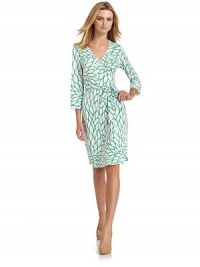 THE LOOKAbstract leaf-inspired printSurplice v-necklineWrap-front styleThree-quarter length sleeves with vented cuffsSelf sash ties around the waistTHE FITAbout 34 from shoulder to hemTHE MATERIAL92% polyester/8% spandex CARE & ORIGINDry cleanImportedModel shown is 5'9½ (176cm) wearing US size Small. THE LOOKAbstract leaf-inspired printSurplice v-necklineWrap-front styleThree-quarter length sleeves with vented cuffsSelf sash ties around the waistTHE FITAbout 34 from shoulder to hemTHE MATERIAL92% polyester/8% spandex CARE & ORIGINDry cleanImportedModel shown is 5'9½ (176cm) wearing US size Small.