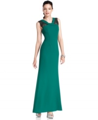 Be gorgeous in this green evening gown from BCBGMAXAZRIA--lace insets at the shoulders add a shot of decadence. Be gorgeous in this green evening gown from BCBGMAXAZRIA--lace insets at the shoulders add a shot of decadence.