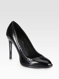 Traditional perforated details line this sophisticated pump of Italian leather with a hint of sheen. Stacked heel, 4 (100mm)Leather upperLeather lining and solePadded insoleMade in Italy Traditional perforated details line this sophisticated pump of Italian leather with a hint of sheen. Stacked heel, 4 (100mm)Leather upperLeather lining and solePadded insoleMade in Italy