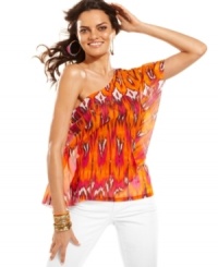 Infuse instant drama to any look with INC's one-shouldered petite top, showcasing a dynamic print. Infuse instant drama to any look with INC's one-shouldered petite top, showcasing a dynamic print.