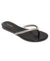 GUESS gives the humble thong sandal an elegant touch with can't-miss rhinestone embellishment.