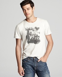 The abstract graphic on the front of this tee lends intrigue to your attire when you're shooting for a simplified, pared down look. The abstract graphic on the front of this tee lends intrigue to your attire when you're shooting for a simplified, pared down look.