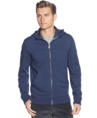Solid non-baggy hoodie by Calvin Klein. Perfect to layer up with out the bulk. Solid non-baggy hoodie by Calvin Klein. Perfect to layer up with out the bulk.