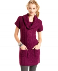 Rock classic fall style in this cable-knit sweater dress from Pink Rose. Features an oversized cowl neck and pockets at the front for stashing your goodies! Rock classic fall style in this cable-knit sweater dress from Pink Rose. Features an oversized cowl neck and pockets at the front for stashing your goodies!