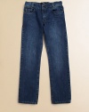 Medium-washed jeans are updated with slight fading, whiskering and leather logo tab in a slim-fitting silhouette.Front button closureAdjustable waistband with belt loopsZip flyFive-pocket styleCottonMachine washImported