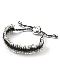 This unique sterling silver hand-woven lanyard with staggered links is a modern, grown-up take in the friendship band. This unique sterling silver hand-woven lanyard with staggered links is a modern, grown-up take in the friendship band.