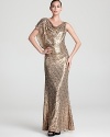 Covered in gilded, gleaming sequins, Badgley Mischka's sparkling gown lends sophistication.