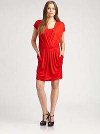 Pretty pleats adorn the front of this v-neck jersey dress offering a flattering fit.V-neckCap sleevesElasticized waistPleated frontPull-on styleAbout 22 from natural waist93% lyocell/7% elastaneDry cleanImported Model shown is 5'10 (177cm) wearing US size Small. 