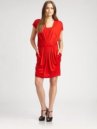 Pretty pleats adorn the front of this v-neck jersey dress offering a flattering fit.V-neckCap sleevesElasticized waistPleated frontPull-on styleAbout 22 from natural waist93% lyocell/7% elastaneDry cleanImported Model shown is 5'10 (177cm) wearing US size Small. Pretty pleats adorn the front of this v-neck jersey dress offering a flattering fit.V-neckCap sleevesElasticized waistPleated frontPull-on styleAbout 22 from natural waist93% lyocell/7% elastaneDry cleanImported Model shown is 5'10 (177cm) wearing US size Small.
