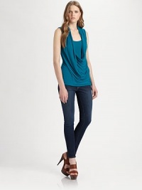Soft jersey tank layered with a draped cowlneck for a contemporary look that can be dressed up or down. CowlneckSleeveless94% rayon/6% spandexDry cleanMade in USAModel shown is 5'10 (177cm) wearing US size Small. Soft jersey tank layered with a draped cowlneck for a contemporary look that can be dressed up or down. CowlneckSleeveless94% rayon/6% spandexDry cleanMade in USAModel shown is 5'10 (177cm) wearing US size Small.