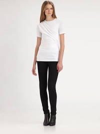 Asymmetrical pleating and side ruching revive this classic short-sleeve tee. RoundneckShort sleevesAsymmetrical pleatsSide ruchingRayon/nylon/spandexDry cleanImportedSIZE & FITModel shown is 5'10 (177cm) wearing US size Small. Asymmetrical pleating and side ruching revive this classic short-sleeve tee. RoundneckShort sleevesAsymmetrical pleatsSide ruchingRayon/nylon/spandexDry cleanImportedSIZE & FITModel shown is 5'10 (177cm) wearing US size Small.