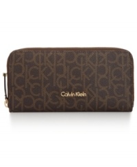 Organization with elegance. This luxe lovely from Calvin Klein will keep your credentials in signature style. Outfitted with the iconic CK monogram, it flaunts multiple pockets and compartments for effortless go-everywhere accessorizing. Organization with elegance. This luxe lovely from Calvin Klein will keep your credentials in signature style. Outfitted with the iconic CK monogram, it flaunts multiple pockets and compartments for effortless go-everywhere accessorizing.