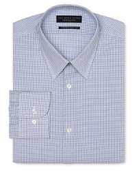 Dress shirt with spread collar, two button barrel cuffs and a contemporary fit through the body, with a blue grid pattern. Dress shirt with spread collar, two button barrel cuffs and a contemporary fit through the body, with a blue grid pattern.