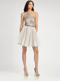 So flirty and festive: a full, playful tulle skirt is crowned by a sequined bodice decorated with a subtle floral pattern.Asymmetrical necklineSleevelessSequined bodiceFull tulle skirtConcealed side zipFully linedAbout 20 from natural waistPolyesterDry cleanImportedModel shown is 5'11 (180) wearing US size 4. So flirty and festive: a full, playful tulle skirt is crowned by a sequined bodice decorated with a subtle floral pattern.Asymmetrical necklineSleevelessSequined bodiceFull tulle skirtConcealed side zipFully linedAbout 20 from natural waistPolyesterDry cleanImportedModel shown is 5'11 (180) wearing US size 4.