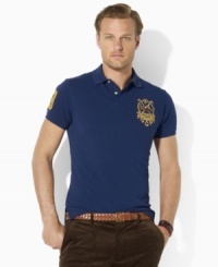 Designed in a trim fit with a slimmer body and a shorter hem, this short-sleeved polo shirt in breathable cotton mesh is embroidered with a Polo Match crest for heritage style. Designed in a trim fit with a slimmer body and a shorter hem, this short-sleeved polo shirt in breathable cotton mesh is embroidered with a Polo Match crest for heritage style.
