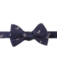 Nail that East coast prepster style with this iconic bowtie from Tommy Hilfiger. Nail that East coast prepster style with this iconic bowtie from Tommy Hilfiger.