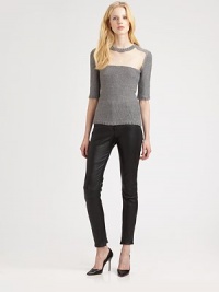 Unexpected front cutout strengthens this classically styled, wool-blend sweater with elbow length sleeves and ribbed trim. Ribbed roundneckCutout front panelElbow-length sleevesRibbed cuffs and hem50% acrylic/30% wool/20% alpacaDry cleanImportedModel shown is 5'10 (177cm) wearing US size Small. Unexpected front cutout strengthens this classically styled, wool-blend sweater with elbow length sleeves and ribbed trim. Ribbed roundneckCutout front panelElbow-length sleevesRibbed cuffs and hem50% acrylic/30% wool/20% alpacaDry cleanImportedModel shown is 5'10 (177cm) wearing US size Small.