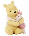 Something to hold on to, this Disney figurine depicts Winnie the Pooh and Piglet locked in a heartwarming bear hug. Featuring soft pastel tones and gold detail in Lenox porcelain.