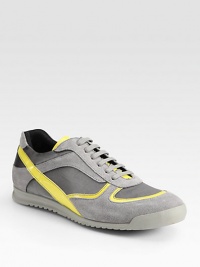 Sport around town in style in this lace-up sneaker crafted of fine canvas and leather.Padded insoleRubber soleImported Sport around town in style in this lace-up sneaker crafted of fine canvas and leather.Padded insoleRubber soleImported