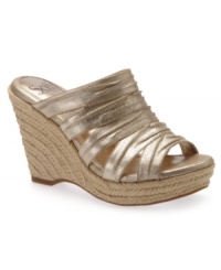 Effortlessly glamorous. Paired with summer skirts and capris, the Boulogne sandals by Sofft are a warm-weather essential with their espadrille wedge and metallic sheen. Effortlessly glamorous. Paired with summer skirts and capris, the Boulogne sandals by Sofft are a warm-weather essential with their espadrille wedge and metallic sheen.