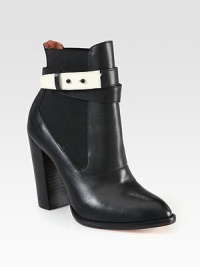 Strut-worthy design of soft leather in contrasting tones, heightened by a fierce stacked heel. Stacked heel, 4 (100mm)Leather upper with side elastic panelsPull-on style and ankle strap with metal tab closuresLeather lining and solePadded insoleImported Strut-worthy design of soft leather in contrasting tones, heightened by a fierce stacked heel. Stacked heel, 4 (100mm)Leather upper with side elastic panelsPull-on style and ankle strap with metal tab closuresLeather lining and solePadded insoleImported
