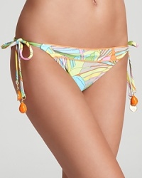 Trina Turk's tropical print bikini begs for a sun bleached day of sand and surf. Play up the pastel color palette with a sheer black sarong. Trina Turk's tropical print bikini begs for a sun bleached day of sand and surf. Play up the pastel color palette with a sheer black sarong.