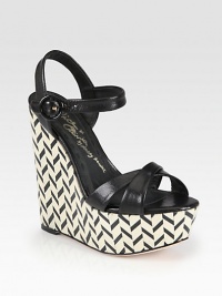 A retro-inflected graphic wedge lifts this strappy silhouette made of rich leather. Chevron stacked wedge, 5¾ (145mm)Chevron stacked platform, 2 (50mm)Compares to a 3¾ heel (95mm)Leather upperAdjustable ankle strapLeather lining and solePadded insoleImported A retro-inflected graphic wedge lifts this strappy silhouette made of rich leather. Chevron stacked wedge, 5¾ (145mm)Chevron stacked platform, 2 (50mm)Compares to a 3¾ heel (95mm)Leather upperAdjustable ankle strapLeather lining and solePadded insoleImported