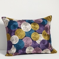 Printed with bold, swirling circles, this decorative pillow adds some color to any room. Printed with bold, swirling circles, this decorative pillow adds some color to any room.