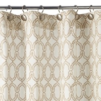 A geometric print in eggplant on white adds global-inspired style to any bath. A geometric print in eggplant on white adds global-inspired style to any bath.