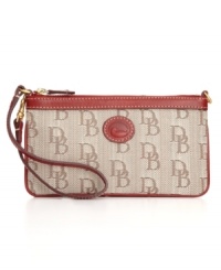 The perfect addition to your Dooney & Bourke satchel or tote, this timeless wristlet will keep you organized and chic all at once. A signature exterior and iconic emblem give this look a classic sensibility. The perfect addition to your Dooney & Bourke satchel or tote, this timeless wristlet will keep you organized and chic all at once. A signature exterior and iconic emblem give this look a classic sensibility.